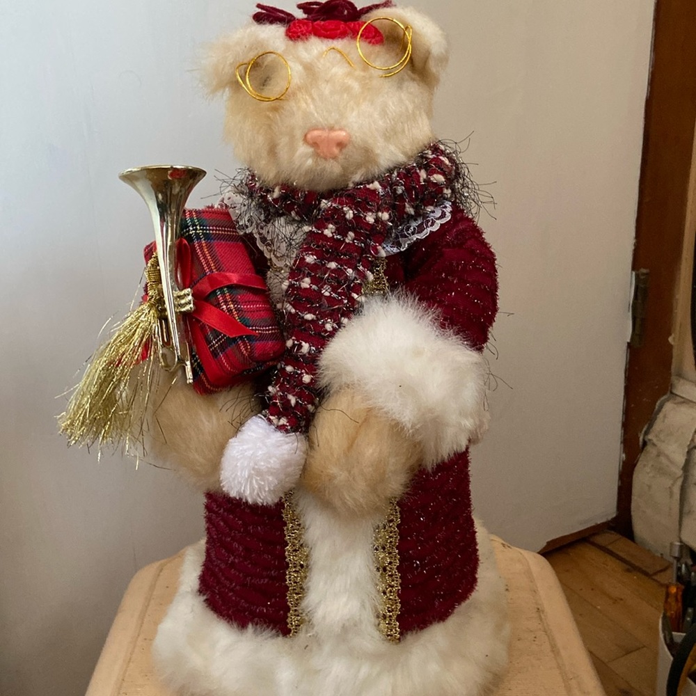 Blonde teddy bear holding gifts stands 17.5” tall